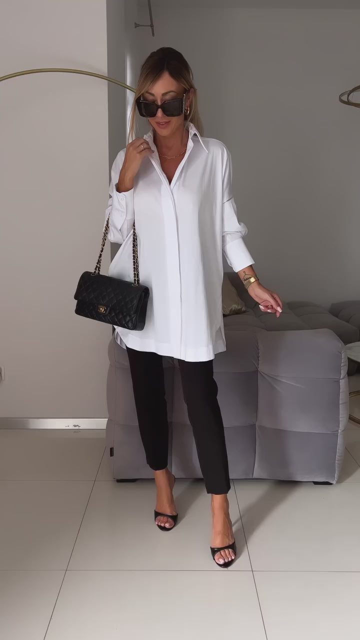 Camisa blanca con solapa y apertura